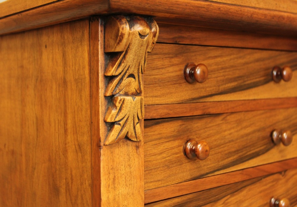 A VICTORIAN ROSEWOOD WELLINGTON CHEST View X