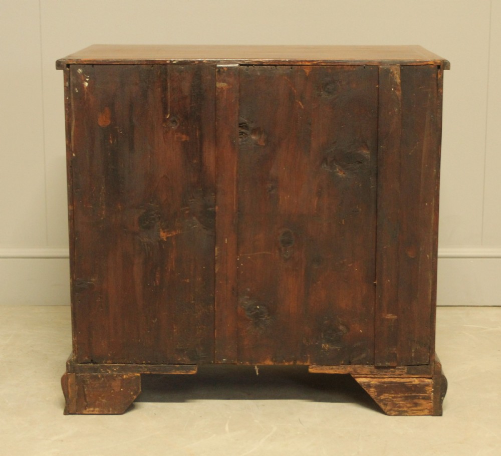 A Georgian walnut kneehole desk.  View X