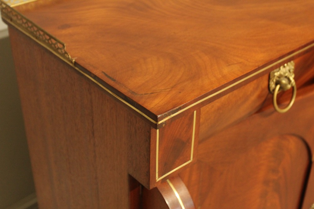 A Victorian two door brass inlaid sideboard.   View IX
