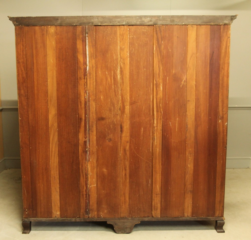 AN EARLY 20TH CENTURY BURR WALNUT TRIPLE WARDROBE.  View X