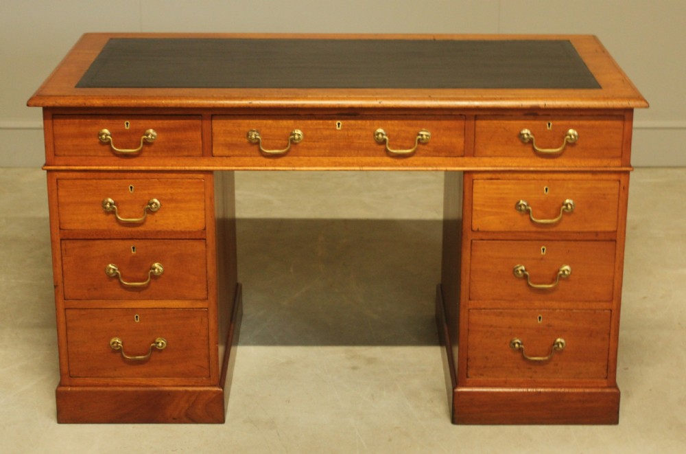 A Victorian mahogany twin pedestal desk. 