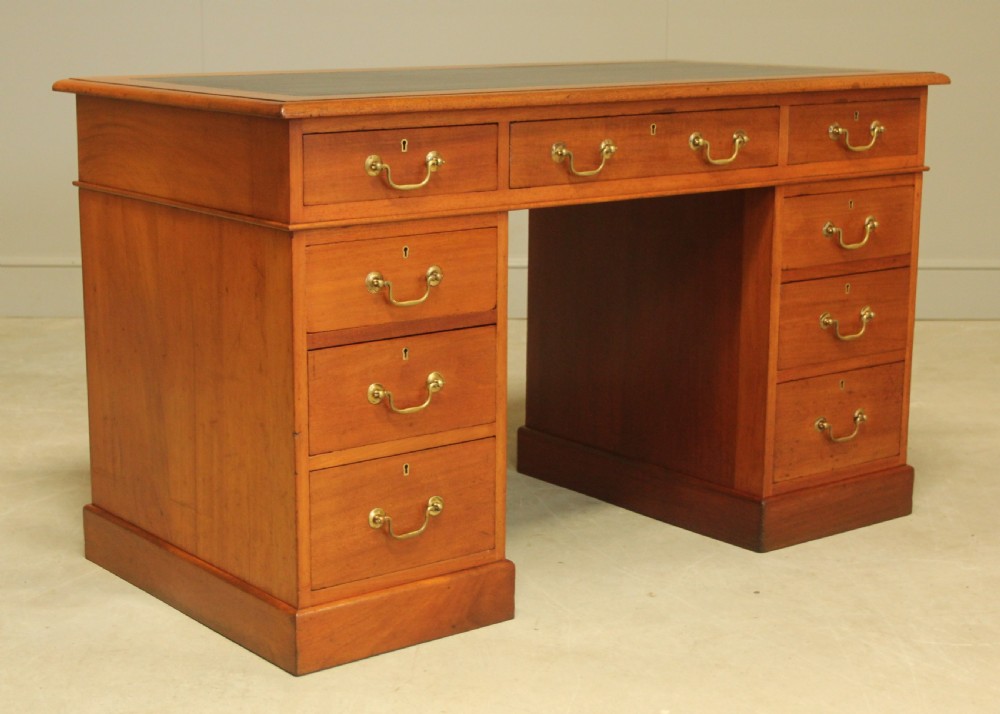 A Victorian mahogany twin pedestal desk.  View IV