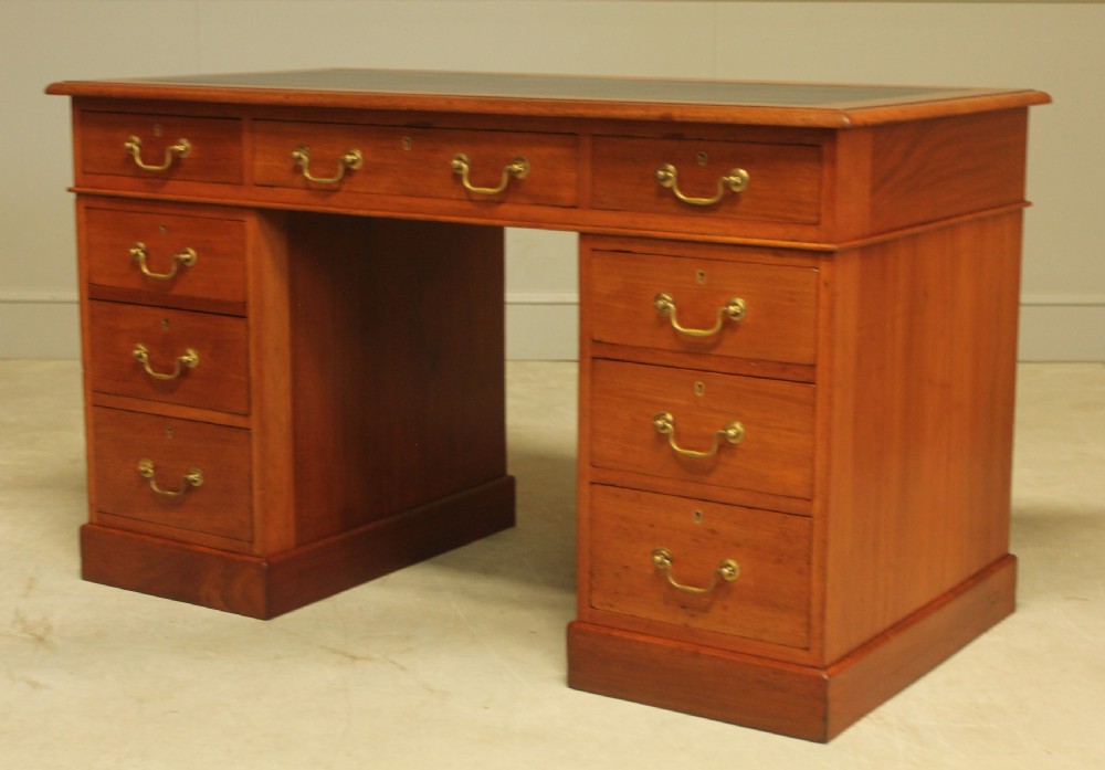 A Victorian mahogany twin pedestal desk.  View V