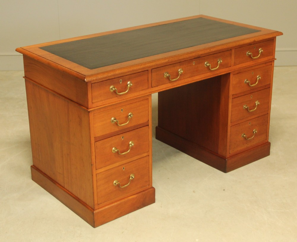 A Victorian mahogany twin pedestal desk.  View VI