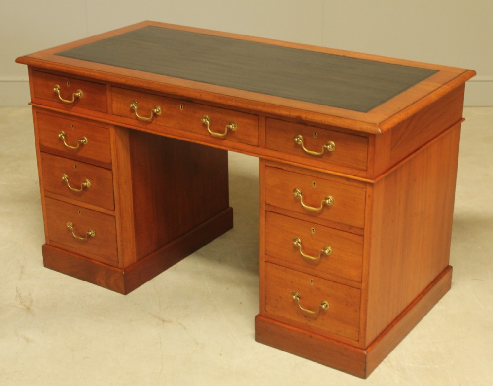 A Victorian mahogany twin pedestal desk.  View VII