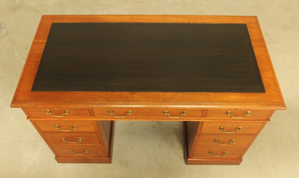 A Victorian mahogany twin pedestal desk.  View IX