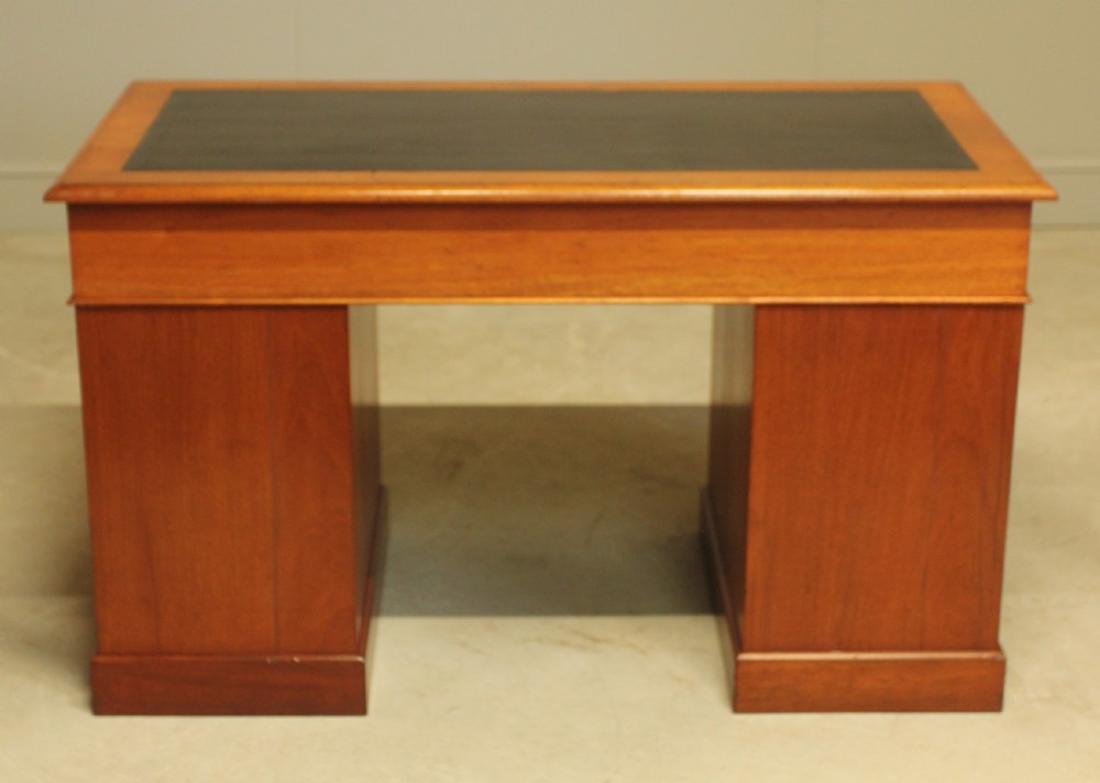 A Victorian mahogany twin pedestal desk.  View XII