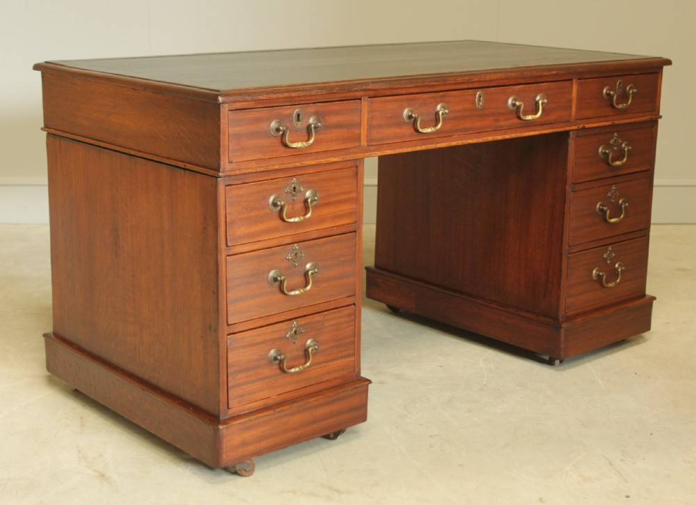 A VICTORIAN MAHOGANY TWIN PEDESTAL DESK View II