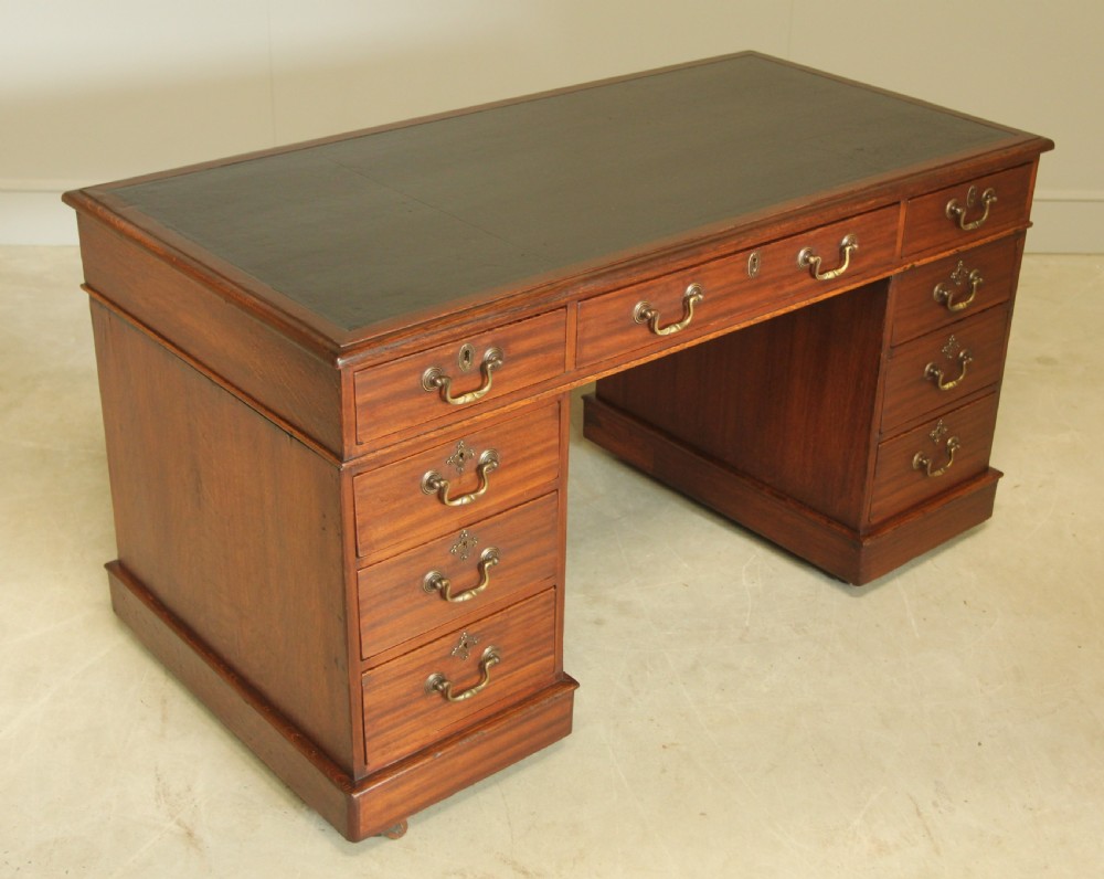 A VICTORIAN MAHOGANY TWIN PEDESTAL DESK View V