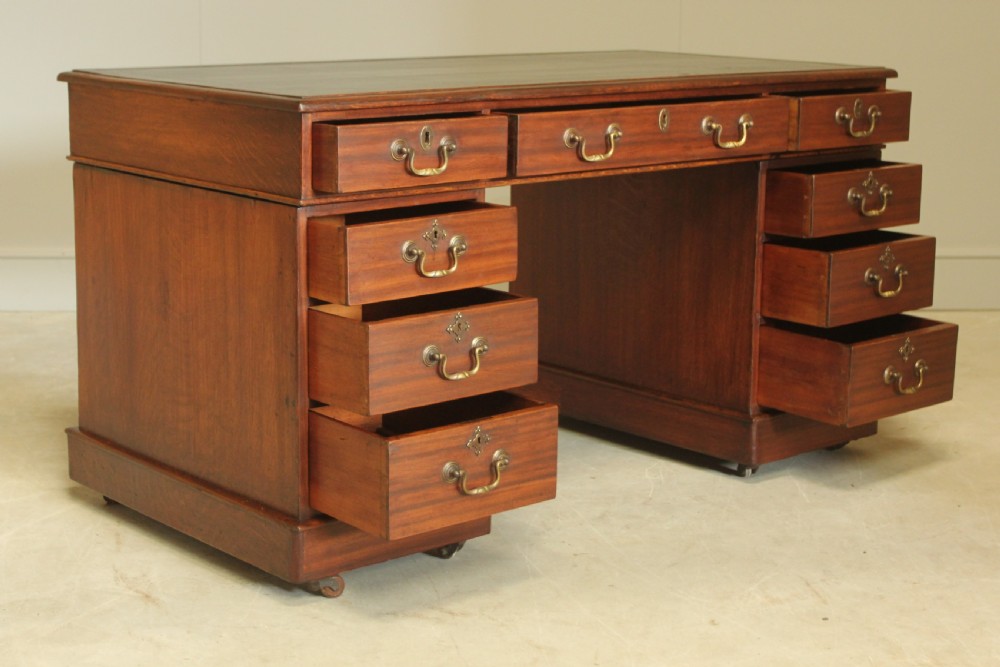 A VICTORIAN MAHOGANY TWIN PEDESTAL DESK View VI