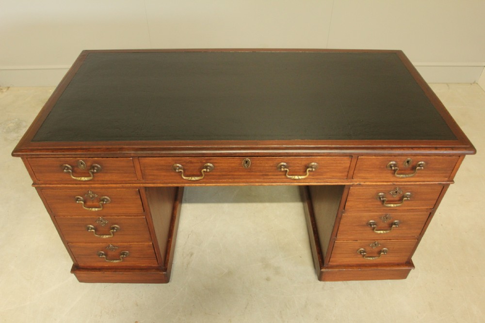 A VICTORIAN MAHOGANY TWIN PEDESTAL DESK View VIII