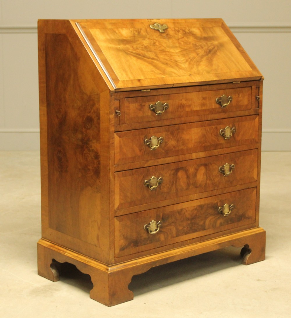 A 19TH CENTURY BURR WALNUT BUREAU