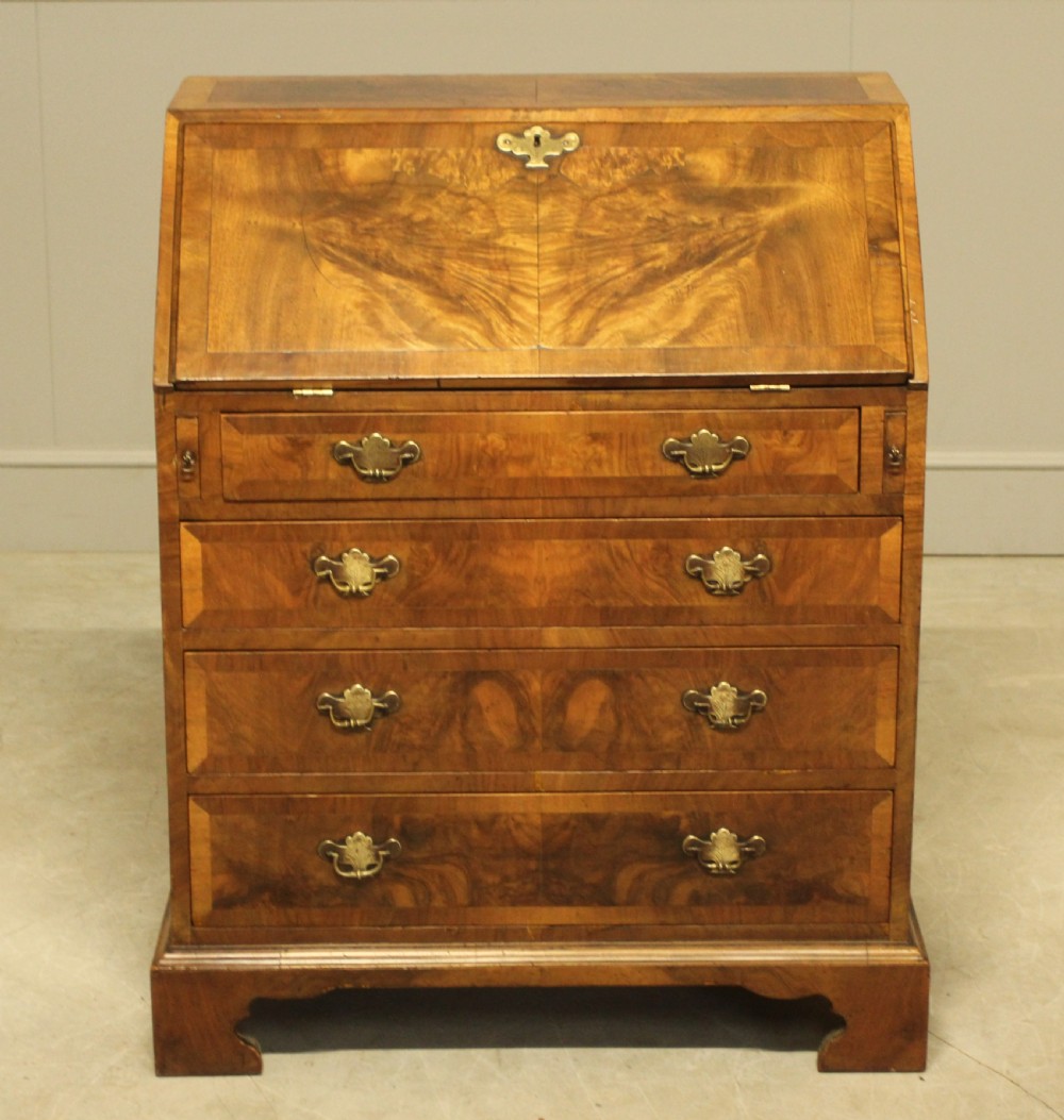 A 19TH CENTURY BURR WALNUT BUREAU View II