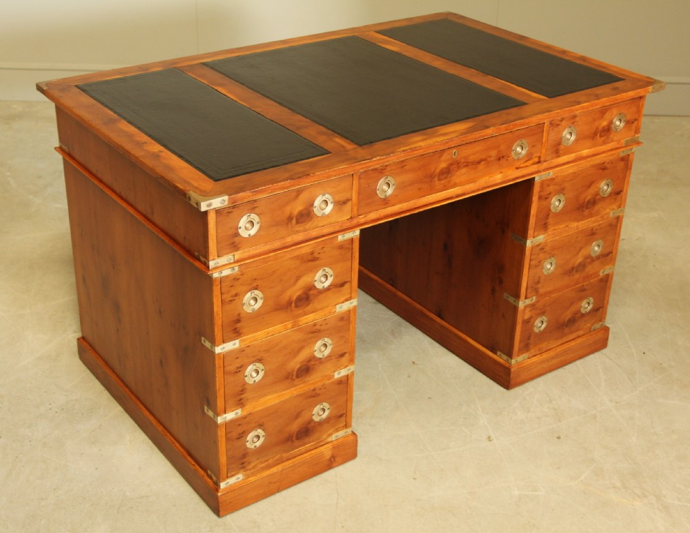 AN EARLY 20TH CENTURY YEW TWIN PEDISTAL DESK View II