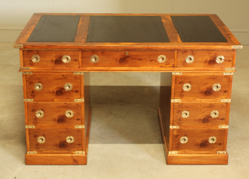 AN EARLY 20TH CENTURY YEW TWIN PEDISTAL DESK View III