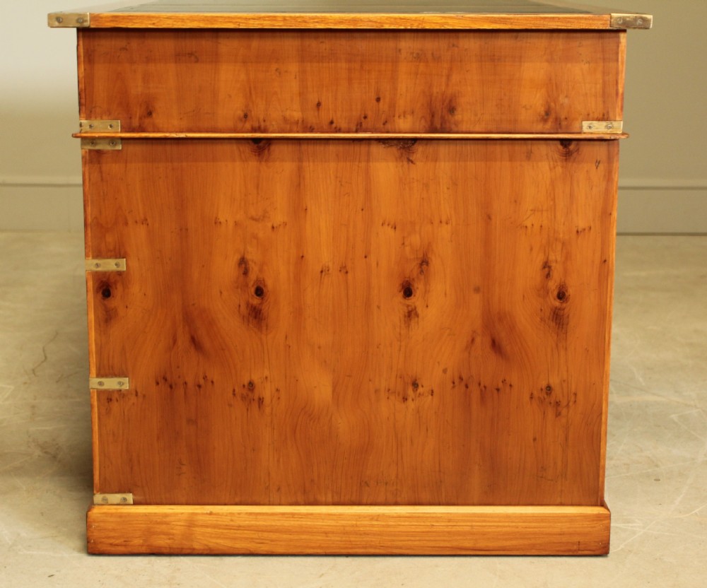 AN EARLY 20TH CENTURY YEW TWIN PEDISTAL DESK View X