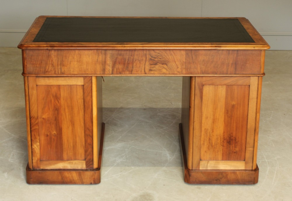 A VICTORIAN BURR WALNUT TWIN PEDESTAL DESDK. View X