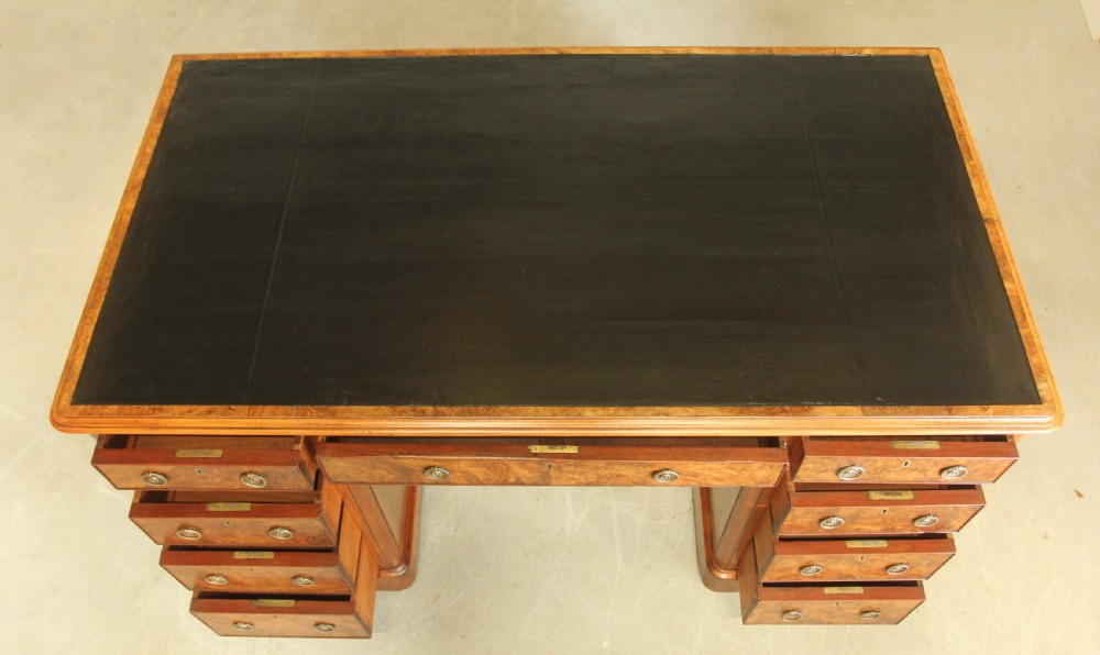 A VICTORIAN BURR WALNUT TWIN PEDESTAL DESK. View VIII
