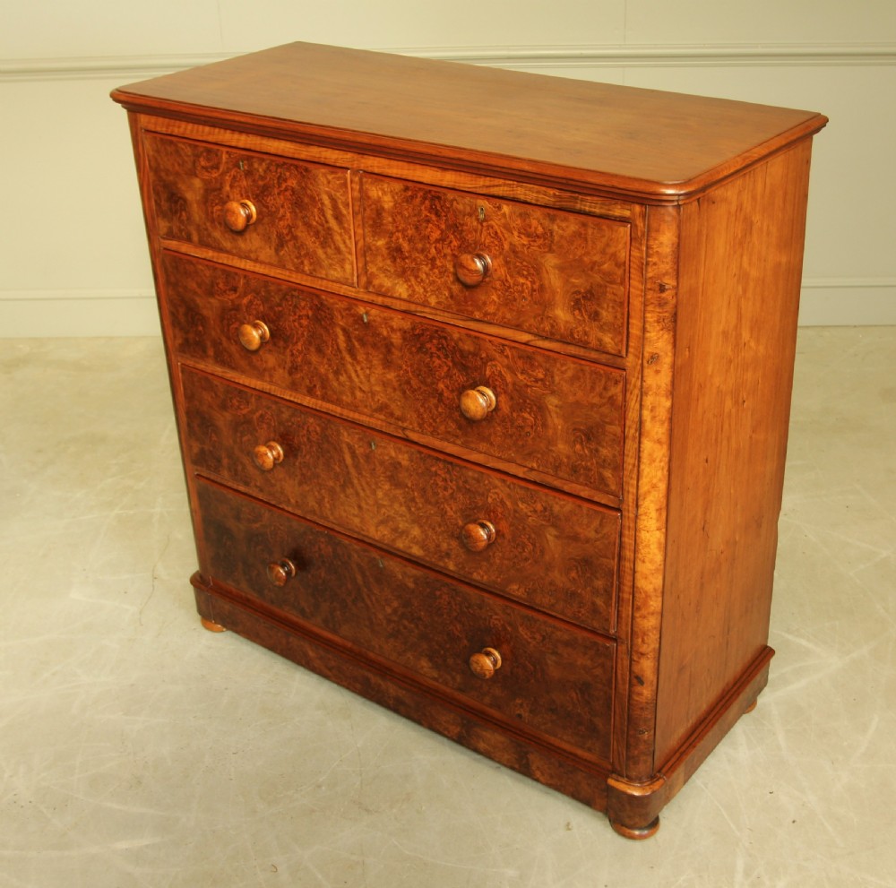 A VICTORIAN BURR WALNUT CHEST OF DRAWERS. View VI
