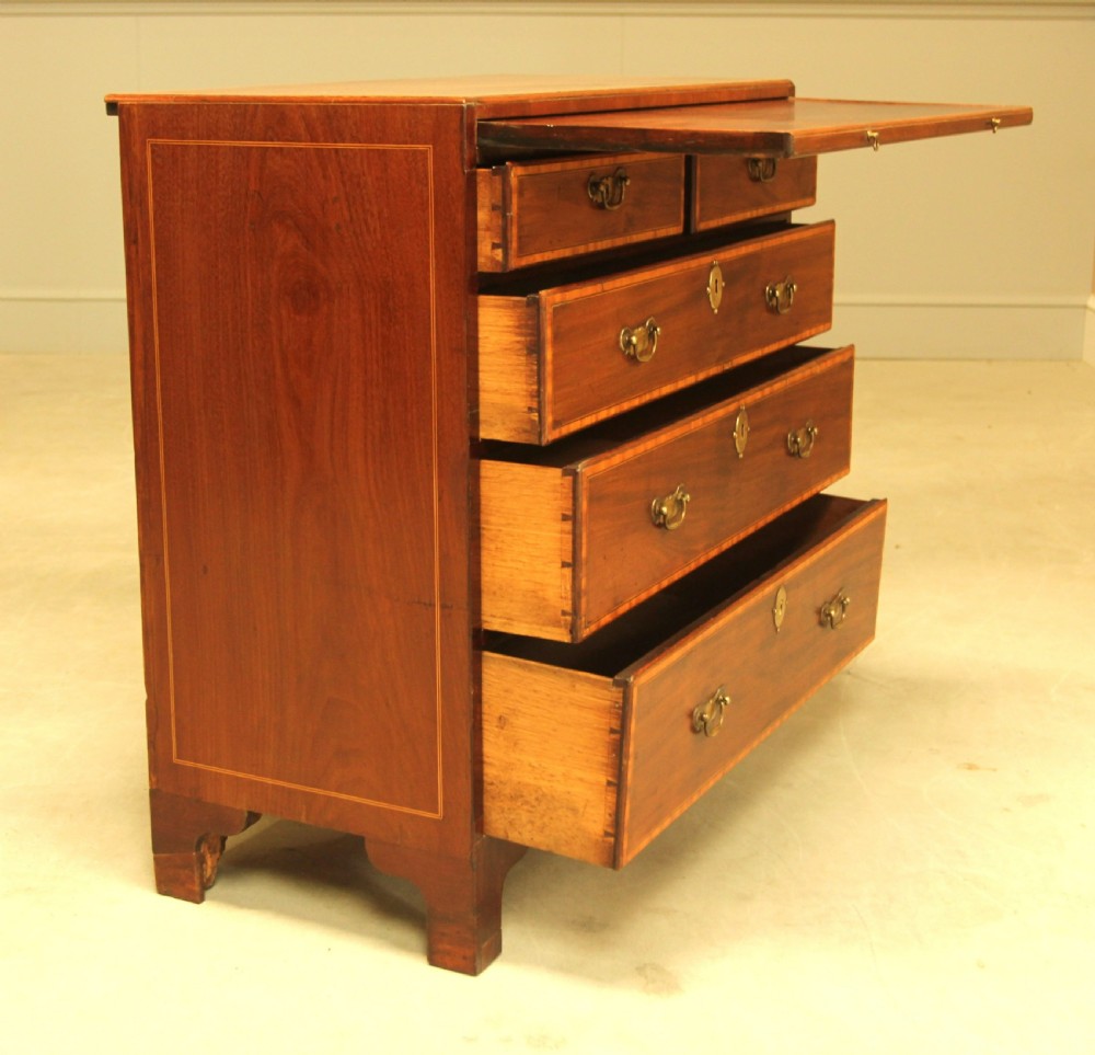 A 19th century mahogany Bachelor chest of drawers View IX