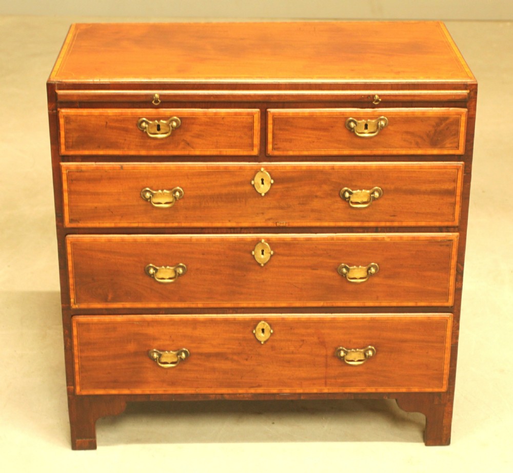 A 19th century mahogany Bachelor chest of drawers View XI