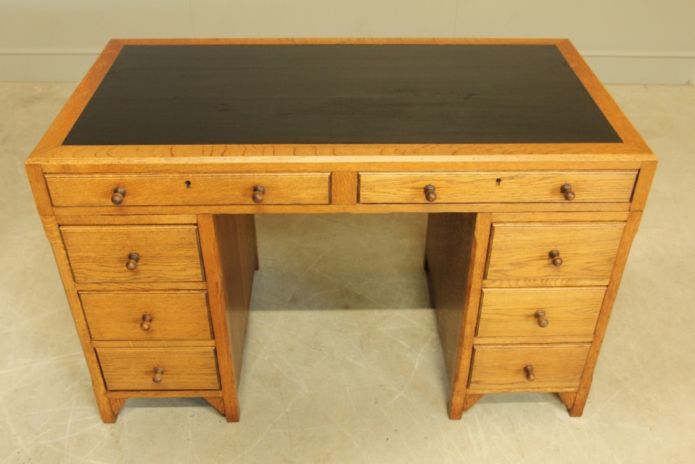 AN EARLY 20TH CENTURY HEALS STYLE OAK TWIN PEDISTAL DESK View II