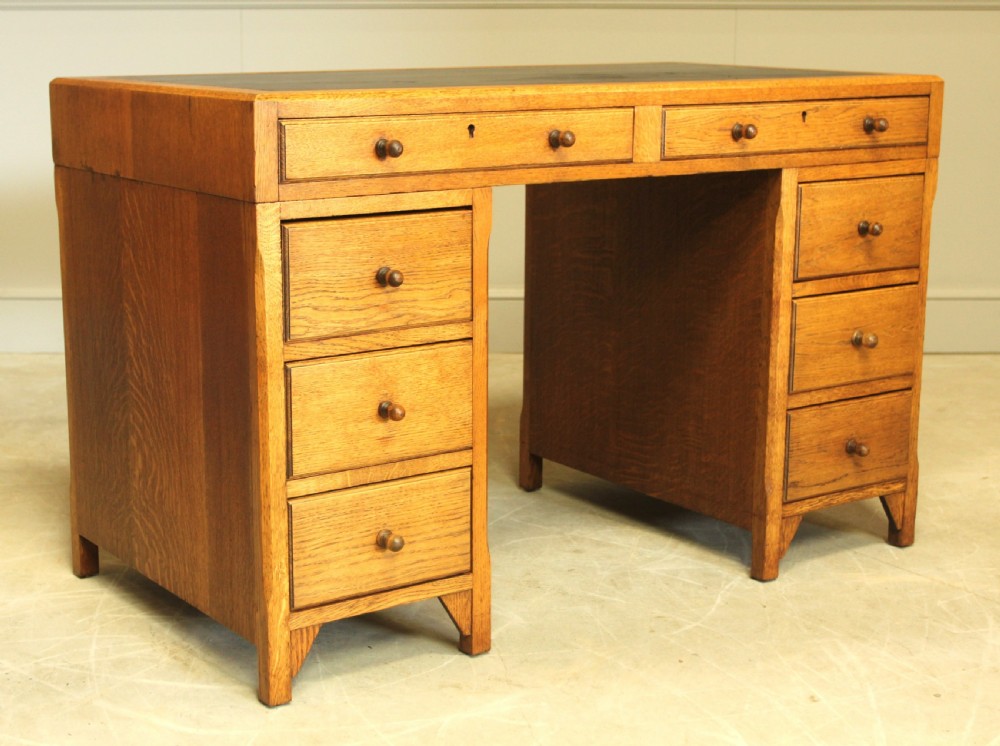 AN EARLY 20TH CENTURY HEALS STYLE OAK TWIN PEDISTAL DESK View V