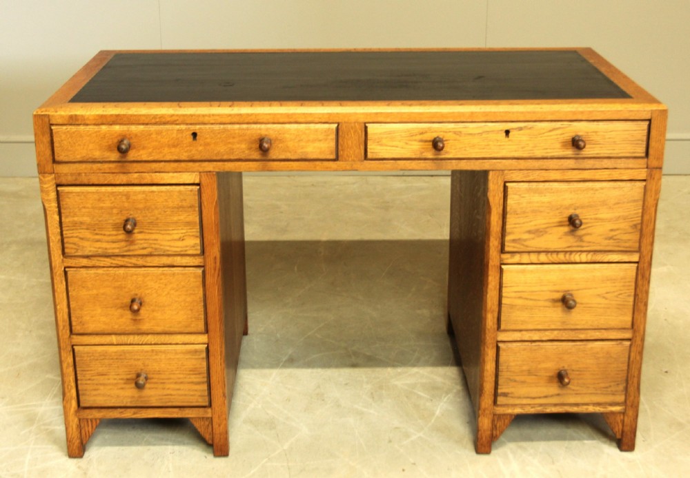 AN EARLY 20TH CENTURY HEALS STYLE OAK TWIN PEDISTAL DESK View VII