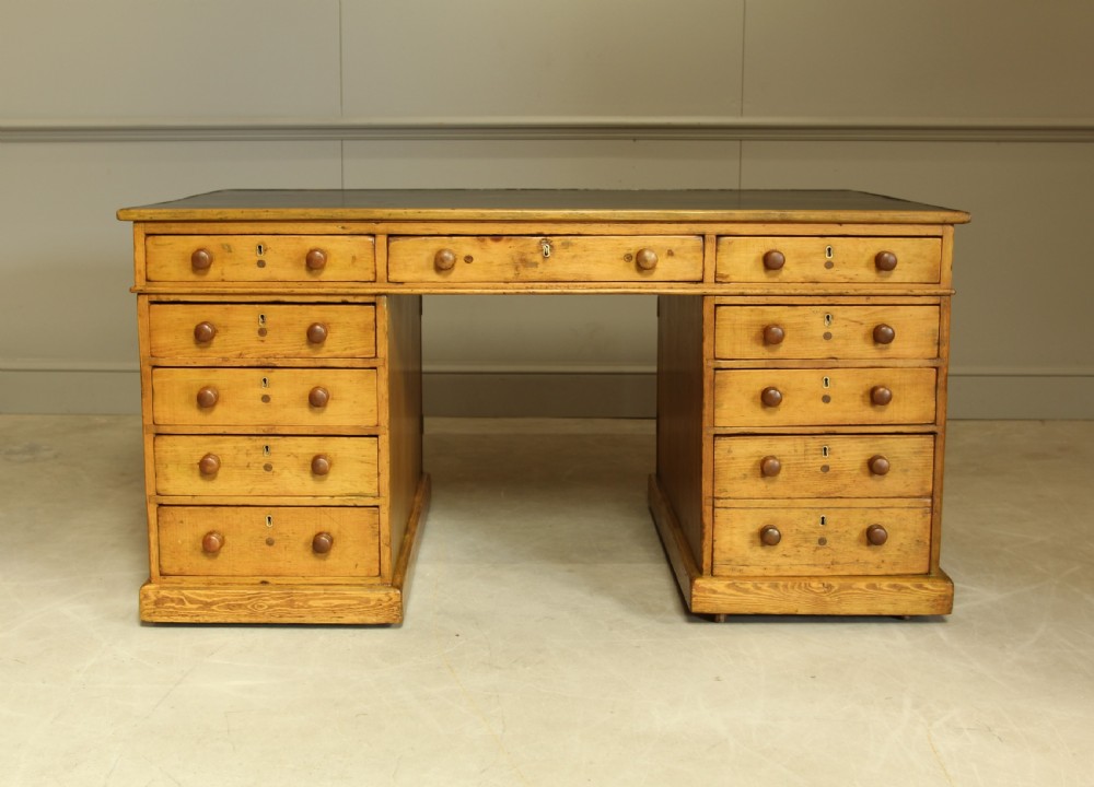 A 19TH CENTURY PITCH PINE PARTNERS DESK View II