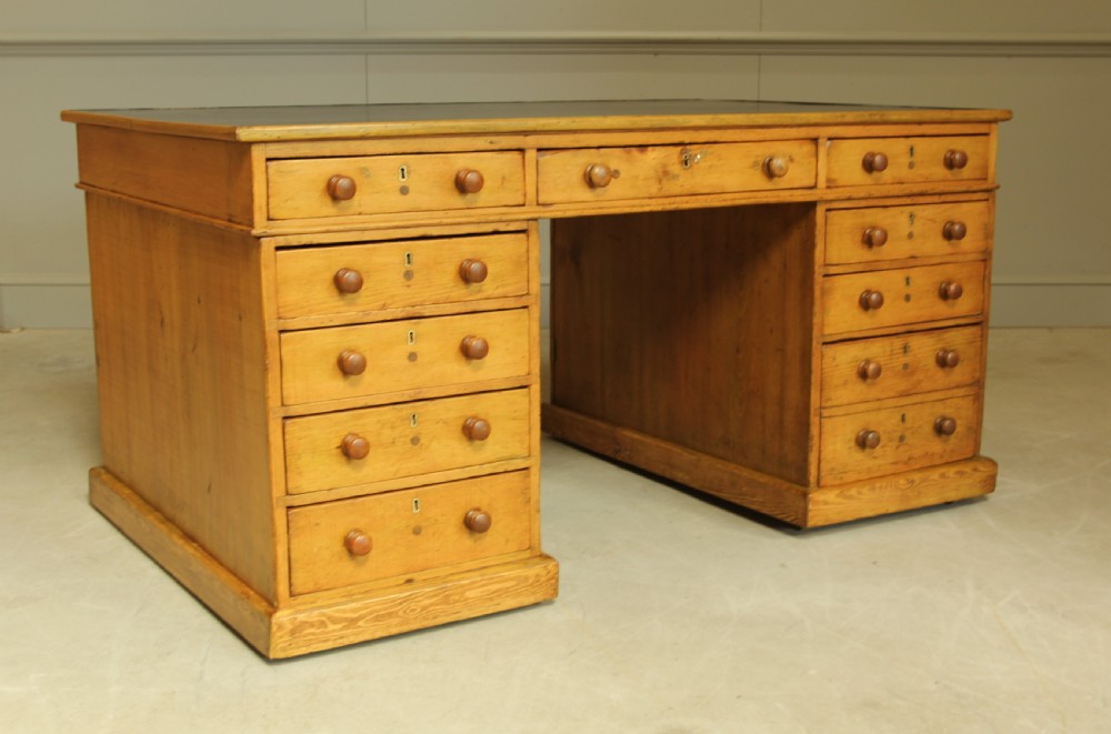 A 19TH CENTURY PITCH PINE PARTNERS DESK View IV