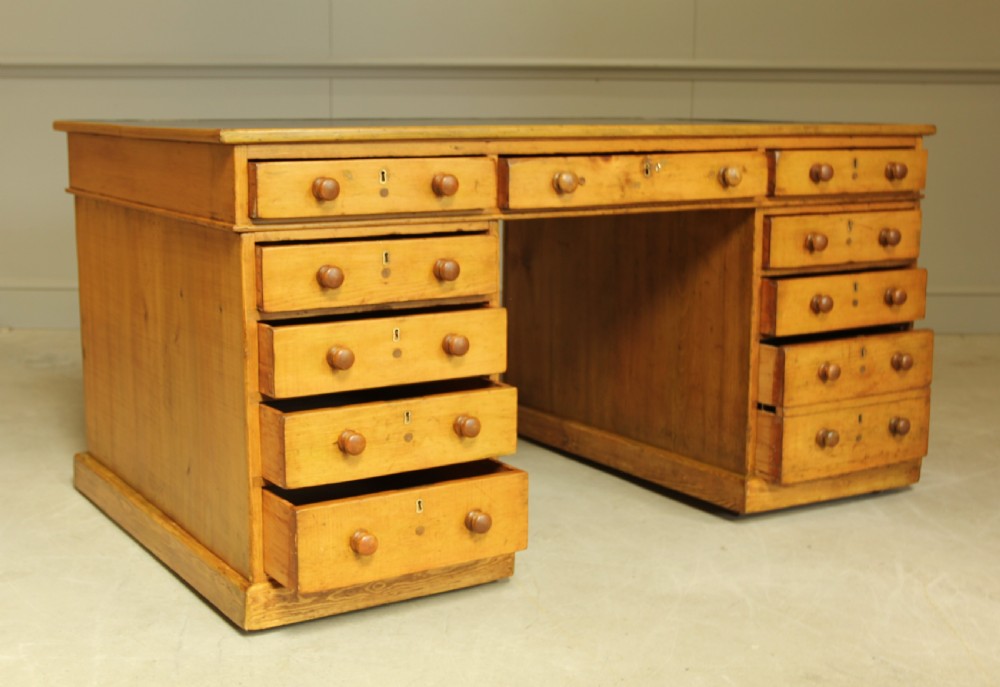 A 19TH CENTURY PITCH PINE PARTNERS DESK View V