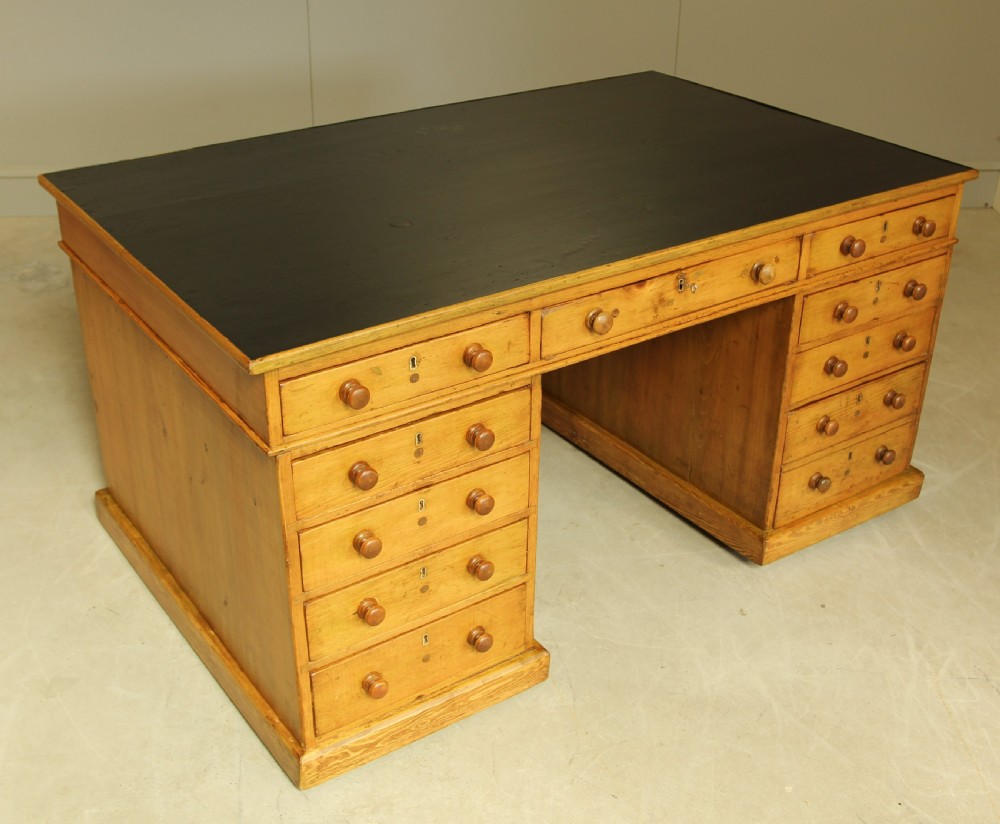 A 19TH CENTURY PITCH PINE PARTNERS DESK View VI