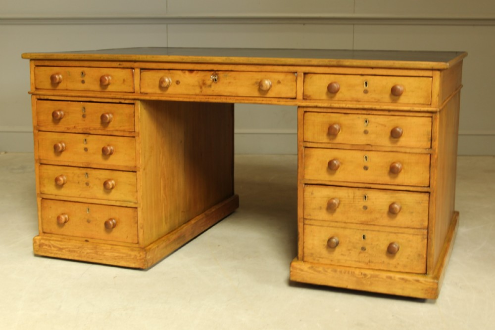 A 19TH CENTURY PITCH PINE PARTNERS DESK View VII