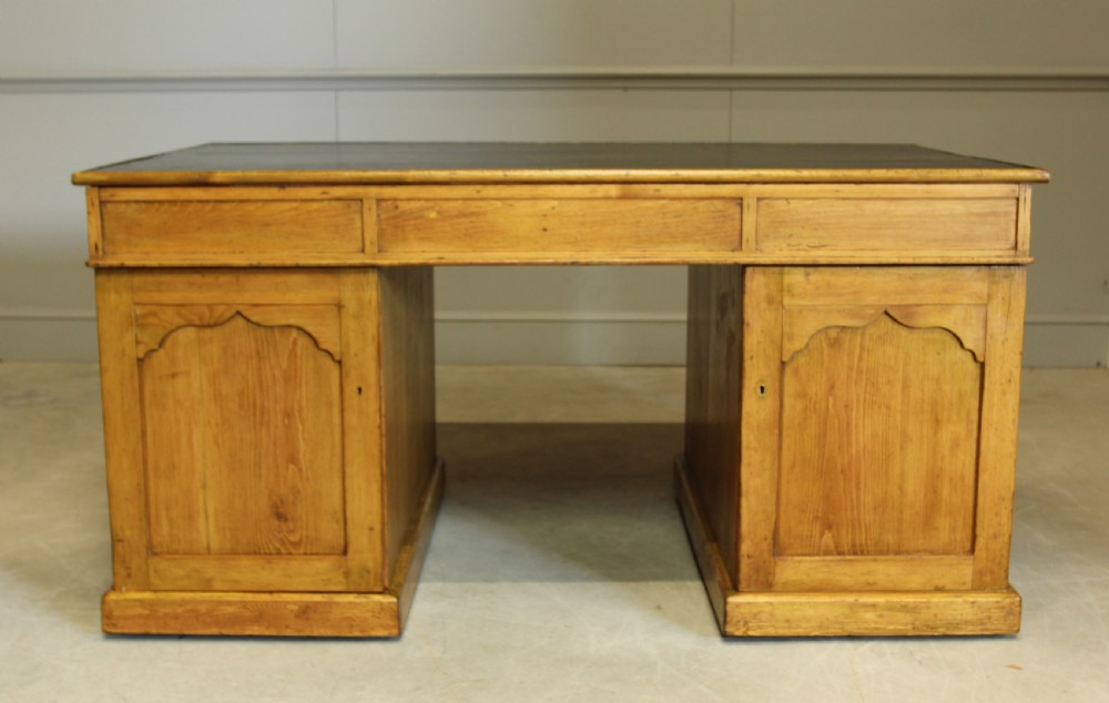 A 19TH CENTURY PITCH PINE PARTNERS DESK View IX