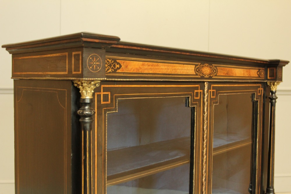 A Victorian Ebonized two door bookcase display  View VII