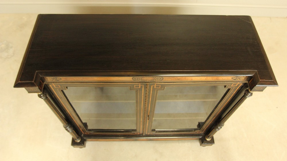A Victorian Ebonized two door bookcase display  View XI