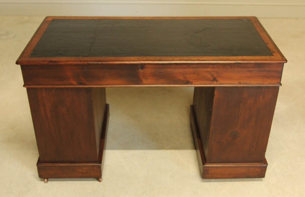 A 19th century Victorian oak twin pedestal writing desk. View XII