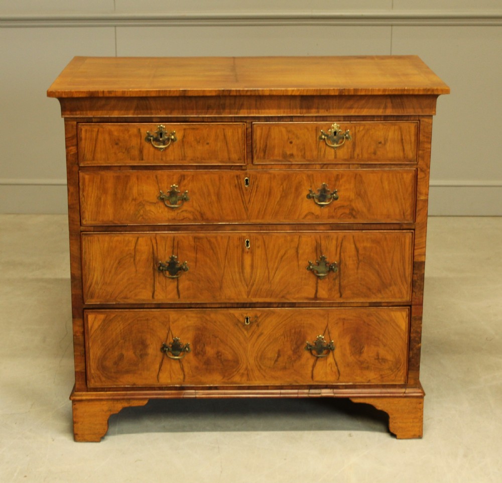 A 19th century Walnut chest of drawers. View II