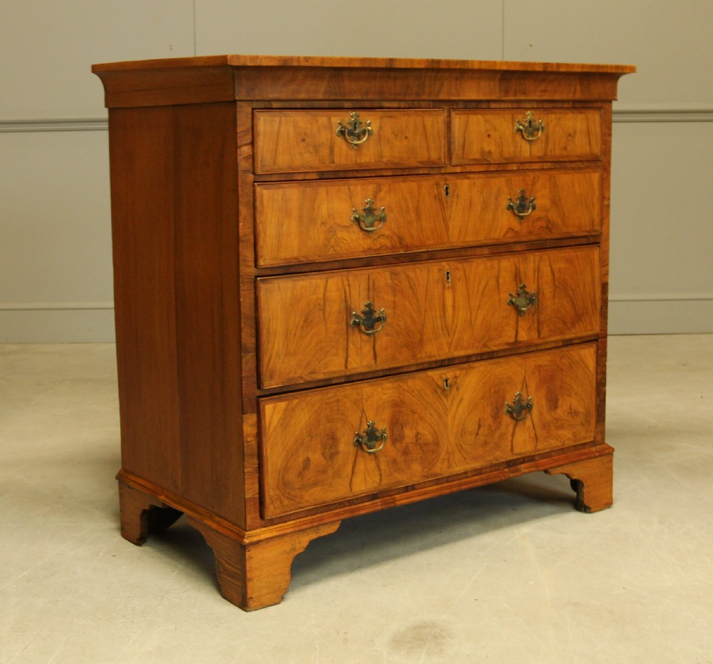 A 19th century Walnut chest of drawers. View III