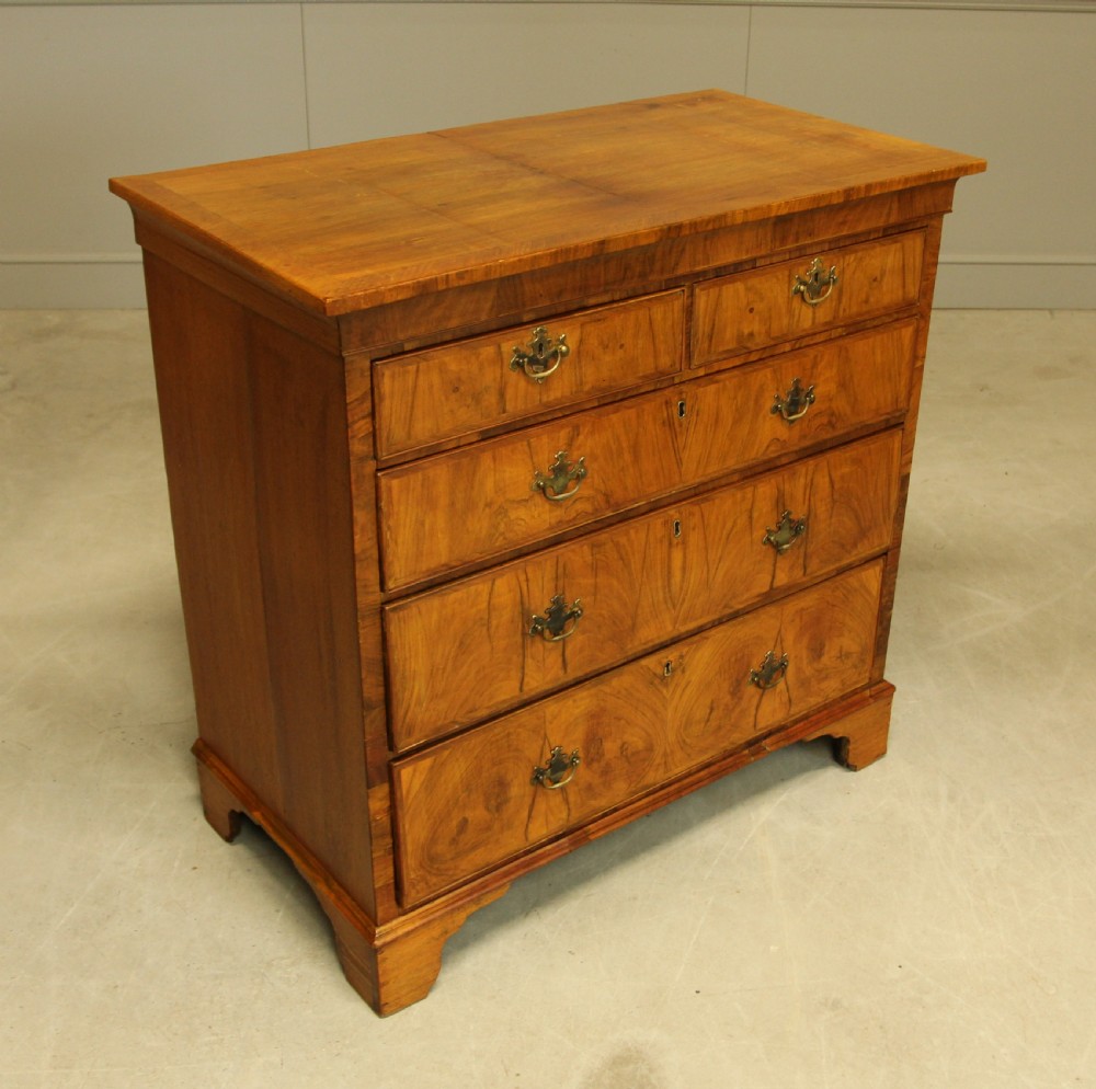 A 19th century Walnut chest of drawers. View IV