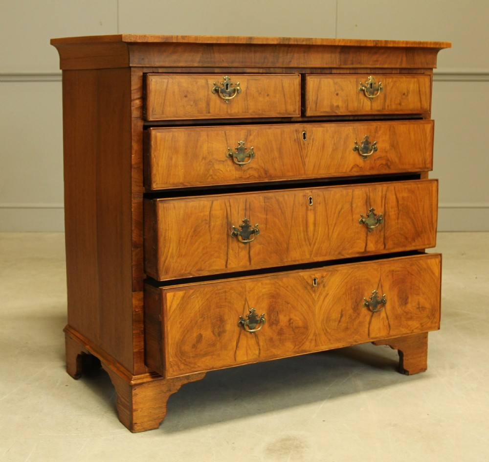 A 19th century Walnut chest of drawers. View V