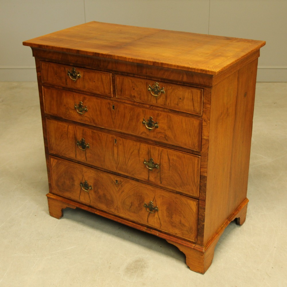 A 19th century Walnut chest of drawers. View VI