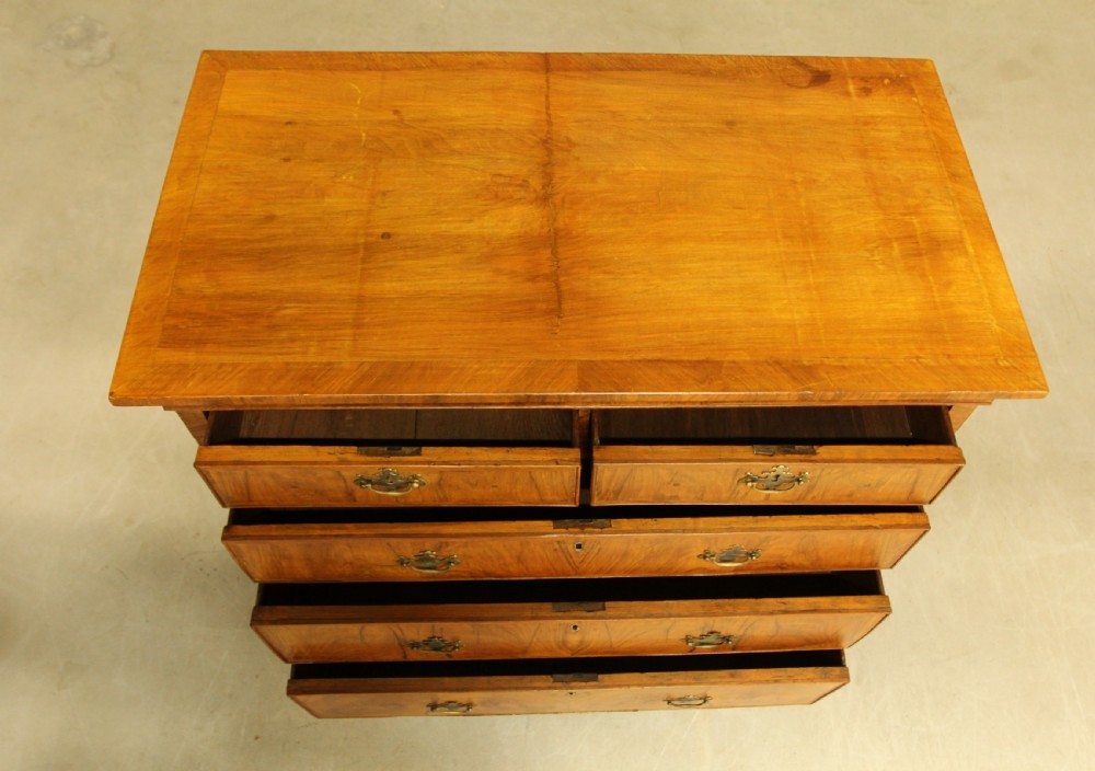 A 19th century Walnut chest of drawers. View X