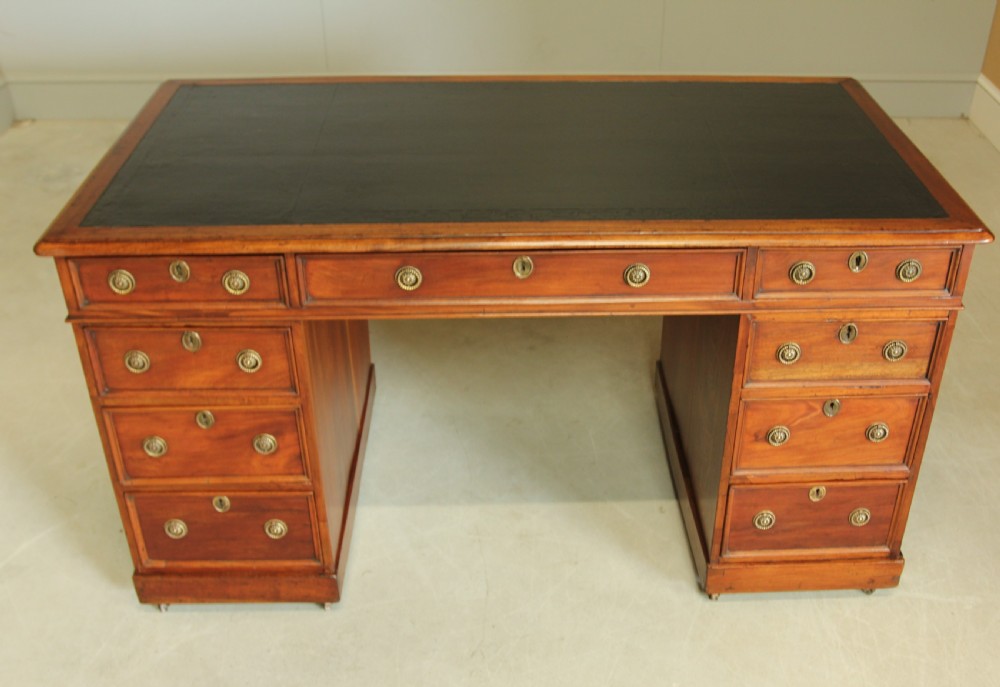 A Late Victorian walnut twin pedestal desk View III