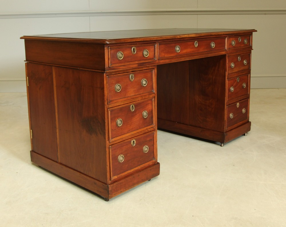 A Late Victorian walnut twin pedestal desk View IV