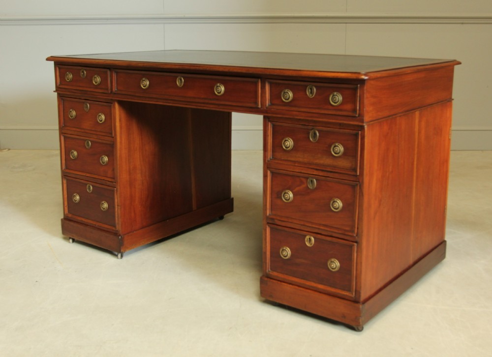 A Late Victorian walnut twin pedestal desk View V