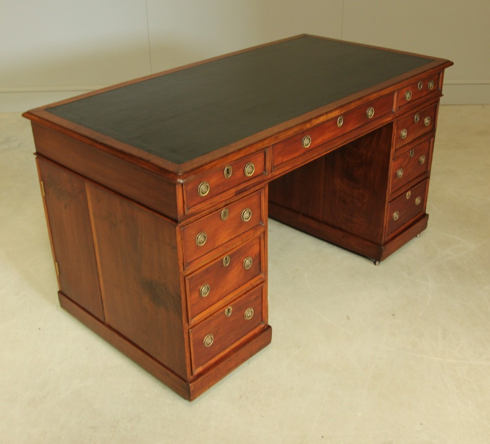 A Late Victorian walnut twin pedestal desk View VII