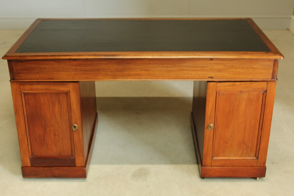 A Late Victorian walnut twin pedestal desk View XI