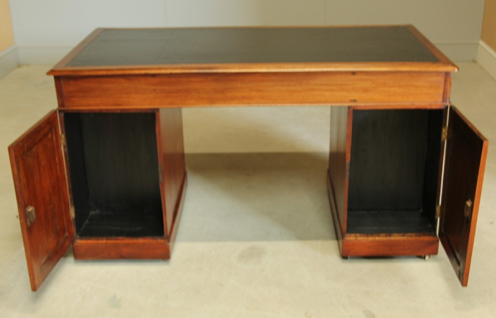 A Late Victorian walnut twin pedestal desk View XII