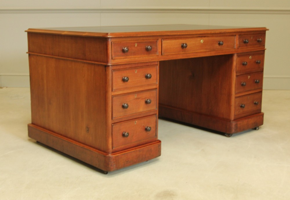 A Large Victorian mahogany twin pedestal desk.